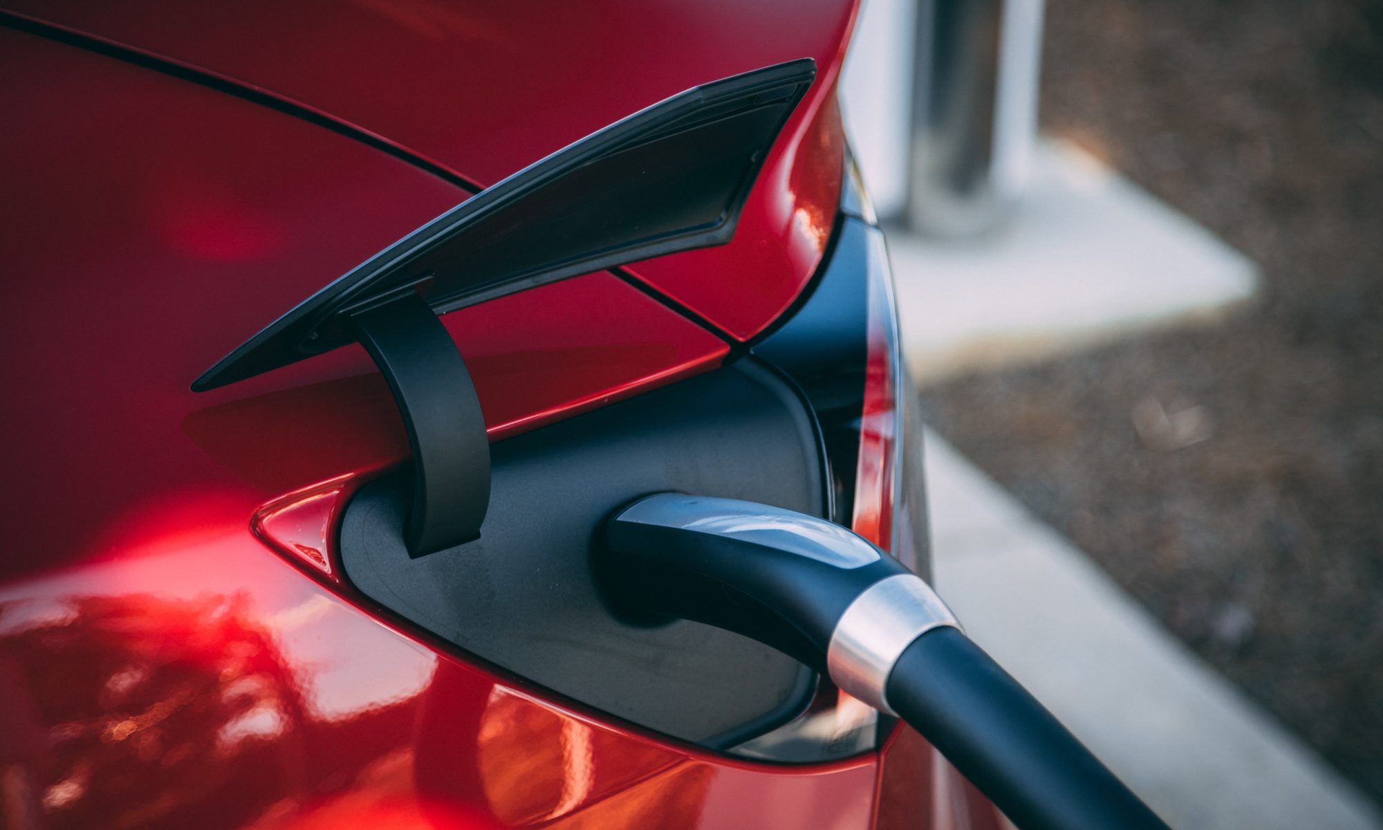 Tesla Model 3 Charging Photo by Vlad Tchompalov on Unsplash